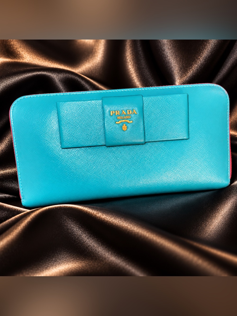 PRADA REWORK: Turquoise Saffiano Leather Bow Clutch with Gold Logo